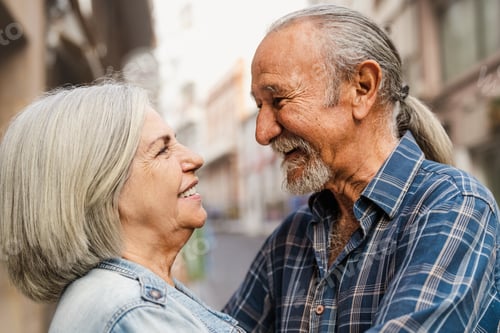 Preview: Happy senior couple having tender moments in the city - Elderly people and love relationship concept