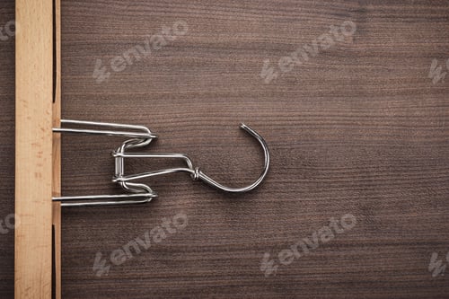 Preview: Wooden Background with Metal Hanger Close Up