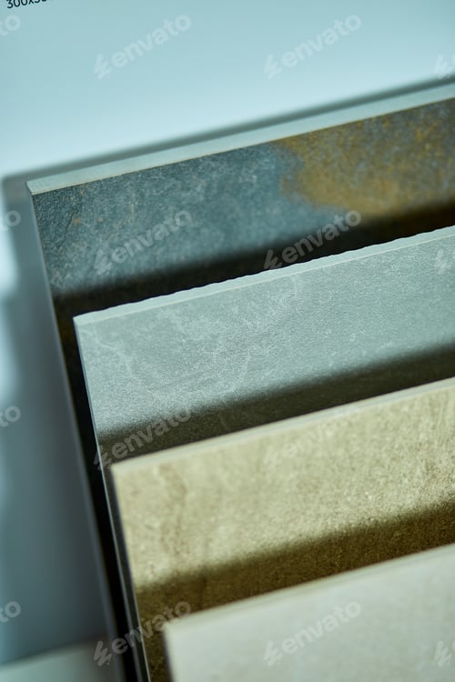 Preview: Various decorative tiles samples. Colorful samples of a stone tile in store
