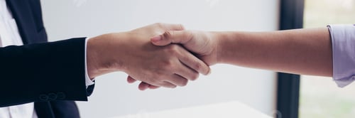 Preview: Home sales agents and buyers work on signing new homes and shaking hands.