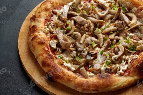 Preview: Delicious homemade pizza with mozzarella, mushrooms, beef and chicken. Wooden background, selective