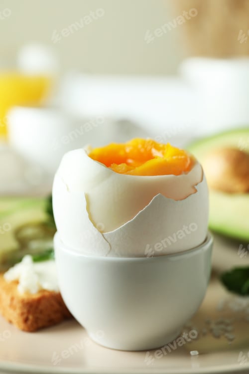 Preview: Concept of tasty breakfast with boiled egg, close up