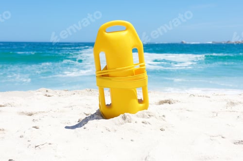 Preview: Life buoy in sand at beach