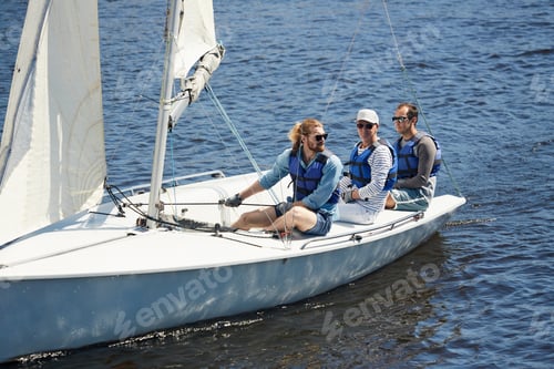 Preview: Men sitting on yacht deck