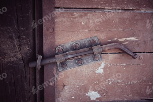 Preview: Old door of barn with latch