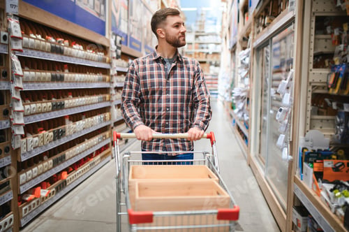 Preview: Portrait of happy mature man standing in hardware store