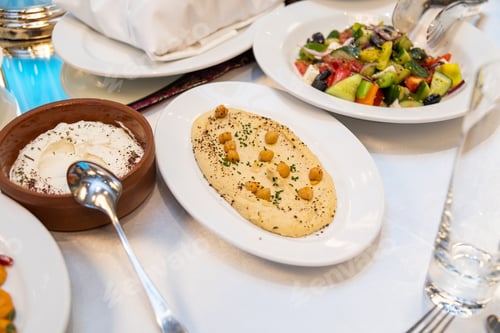 Preview: Mediterranean Appetizers on Dining Table