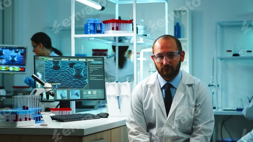 Preview: Tired doctor with glasses looking exhausted at camera