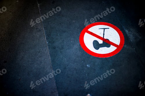 Segway Prohibition Sign on a Dark Surface