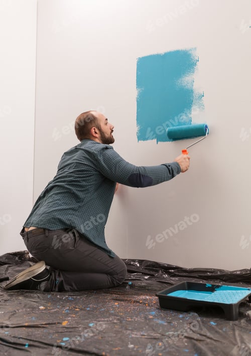 Preview: Sitting on the floor holding the roller