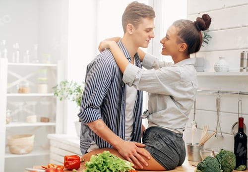 Preview: loving couple is preparing the proper meal