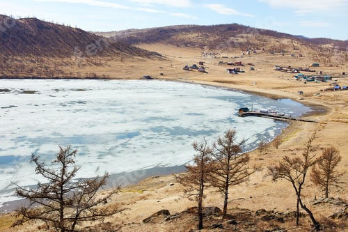 Preview: Spring landscape. Time for the ice to melt on Lake Baikal. Kurkutsk Bay