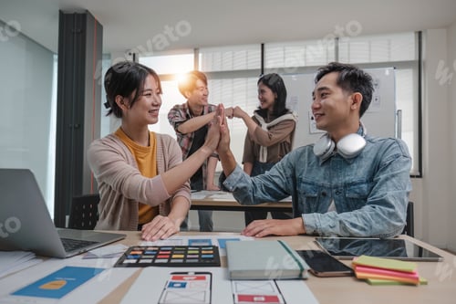 Preview: A group of professional Asian UI, UX graphic designers, or developers is in the meeting