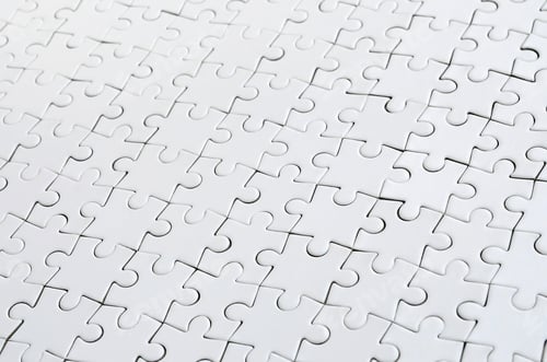 Preview: Close up of a white jigsaw puzzle in assembled state in perspective. Man