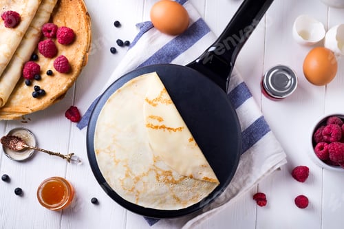 Preview: Preparing for pancakes with berries and jam