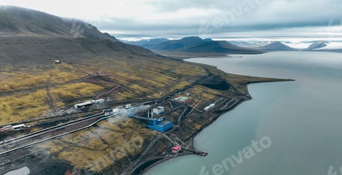 Preview: Aerial view of Barentsburgs industrial area nestled along the coastline of Svalbard