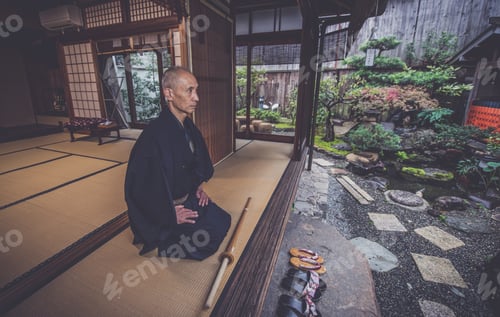 Preview: Japanese man meditating in his garden