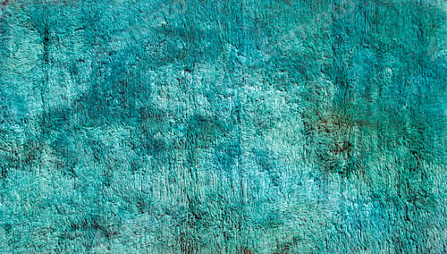 Abstract Teal and Brown Shag Rug Texture