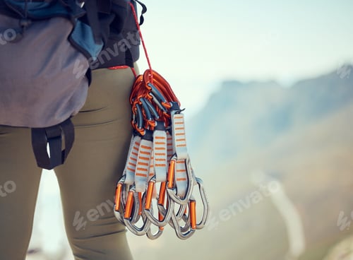 Preview: Adventure, climb and cables of a person with mountain equipment and backpacking in nature. Hiker or