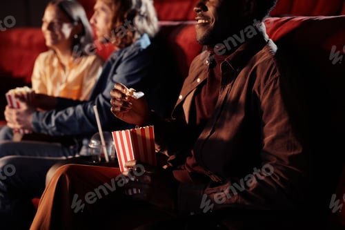 Preview: Man watching movie with his friends