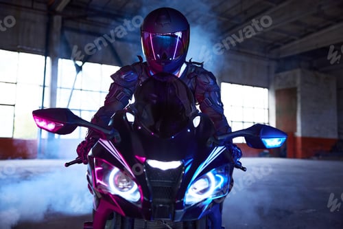 Preview: Front view portrait of motor biker driving sport motorcycle in neon light