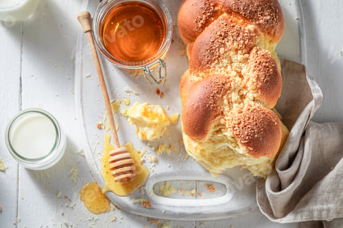Preview: Healthy and sweet golden challah with honey and milk.