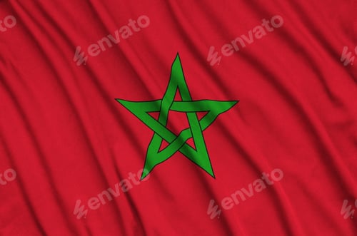 Preview: Morocco flag is depicted on a sports cloth fabric with many folds. Sport team waving banner