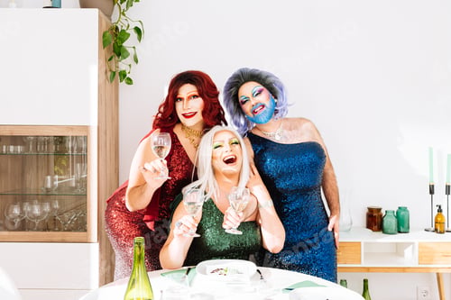 Preview: Joyful transgender women with alcohol drinks