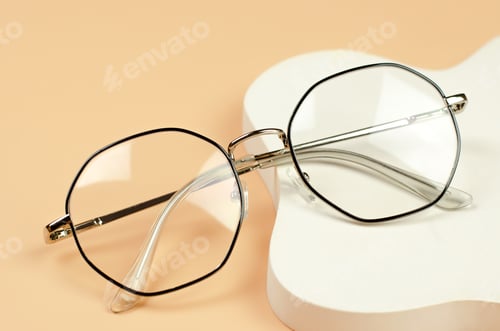 Preview: Stylish women's glasses in a black frame on a beige background