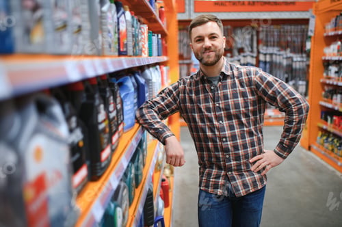 Preview: man buys automobile chemicals in the auto parts store