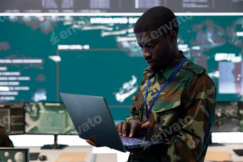 Preview: Technical engineer monitoring surveillance system from CCTV