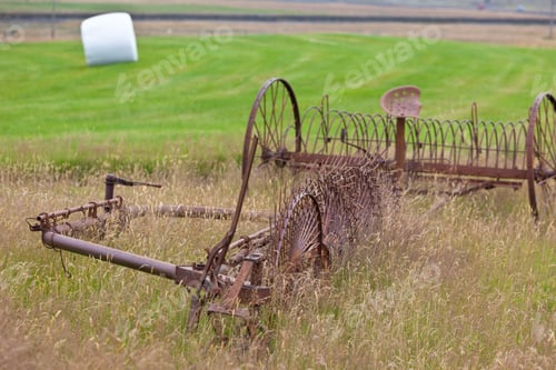 Preview: Rusty plows on a field of Iceland