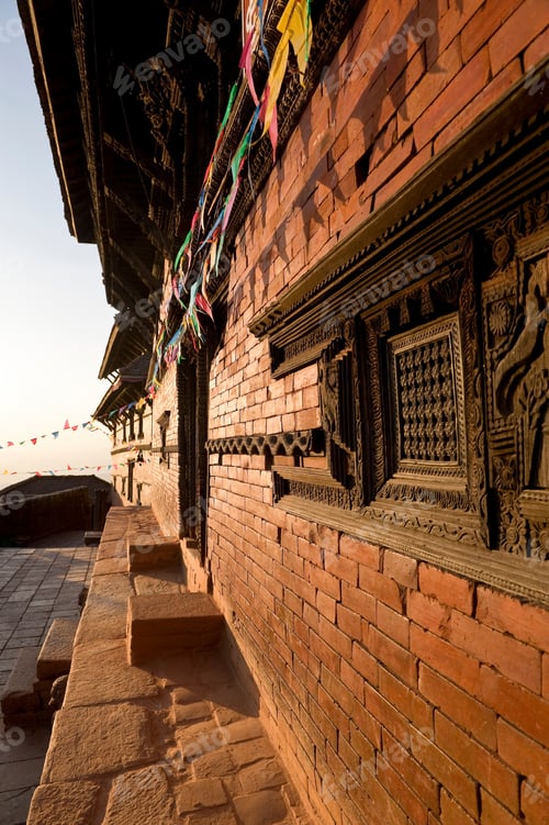 Preview: Ornate carvings on brick building