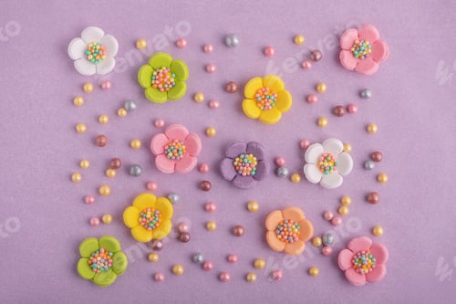 Preview: Colorful Floral Decorations on a Light Purple Background
