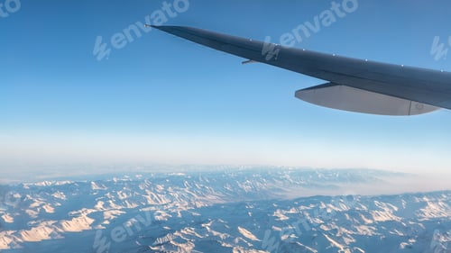 Preview: Wonderful View Of Tian Shan Snow Mountains Through Window An Airplane