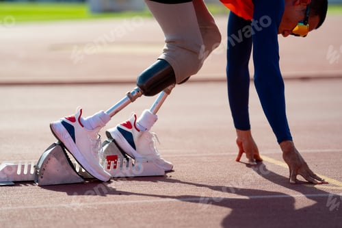 Preview: Asian para-athletes with prosthetic blades sprint on a running track at stadium.