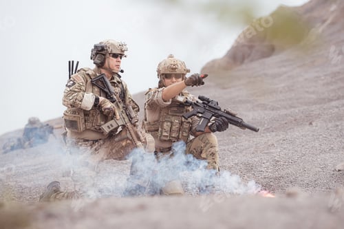 Preview: Soldiers in camouflage military uniforms carrying weapons Reconnaissance missions in rugged mountain