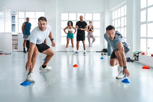 Preview: Athletes Training with Agility Cones in Gym