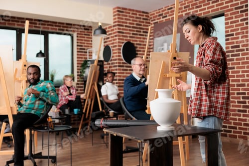 Preview: Group of people attending art course