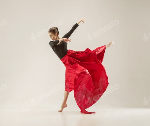 Preview: Modern ballet dancer dancing in full body on white studio background.