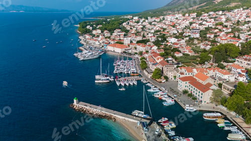 Preview: Explore the vibrant harbor of Brac Island, Croatia, capturing the charm of coastal life