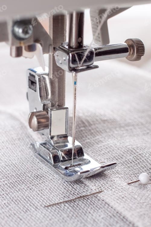 Preview: Modern Sewing Machine Presser Foot With Linen Fabric And Thread, Closeup