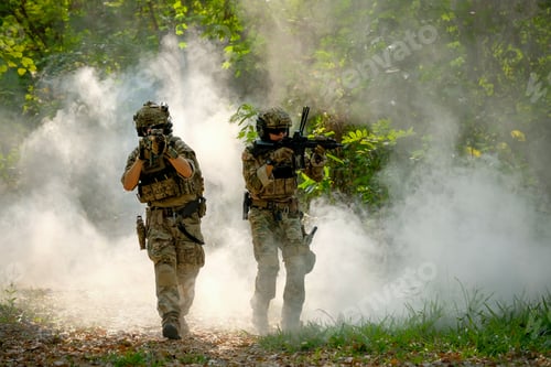 Preview: Two soldiers with the fighting uniform walk on the ground and point gun to enemy