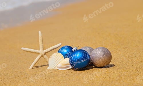 Preview: Christmas decorations on the beach. Selective focus.