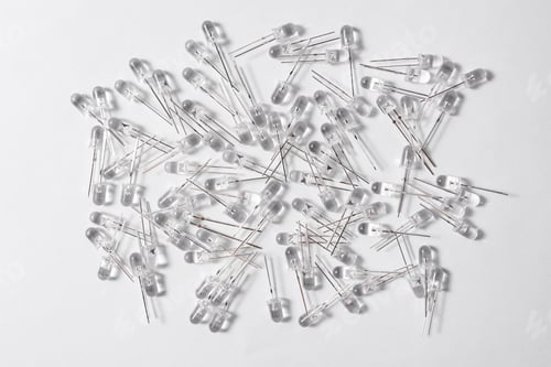 Preview: Many white diodes on a white background. LEDs for illumination. View from above.