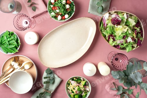 Preview: Spring family dinner. Vegan and vegetarian concept. Top view. Copy space. Serving plates, bowls with