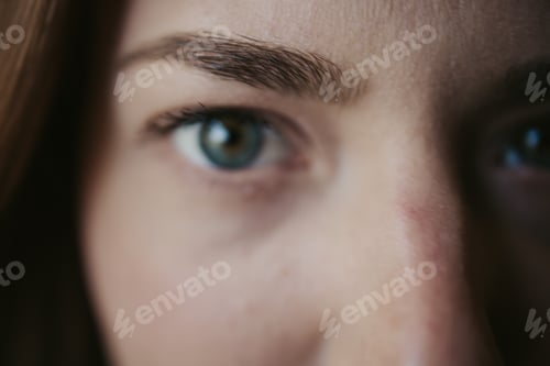 Preview: Closeup shot of a white Caucasian woman with blue eyes