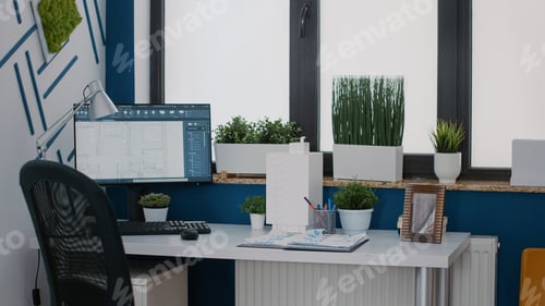 Preview: Close up of monitor with digital blueprints plans on desk for architecture design of building layout