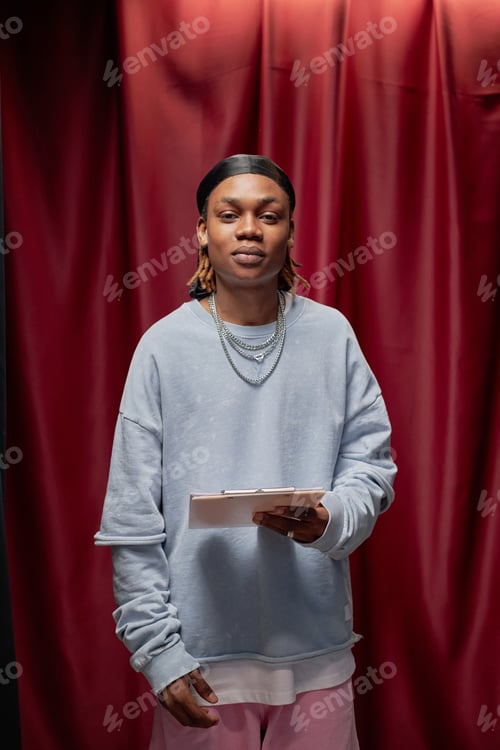 Preview: Portrait of Young Adult Black Man Presenting Talent Competition on Stage