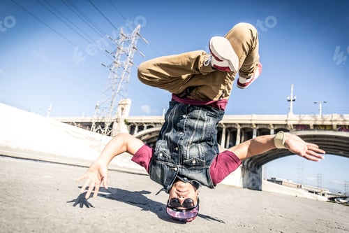 Preview: Breakdancers performing in a water duct